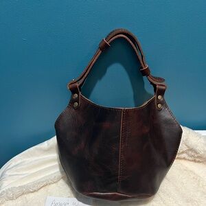 Portland leather small lava kangaroo
Retired style!